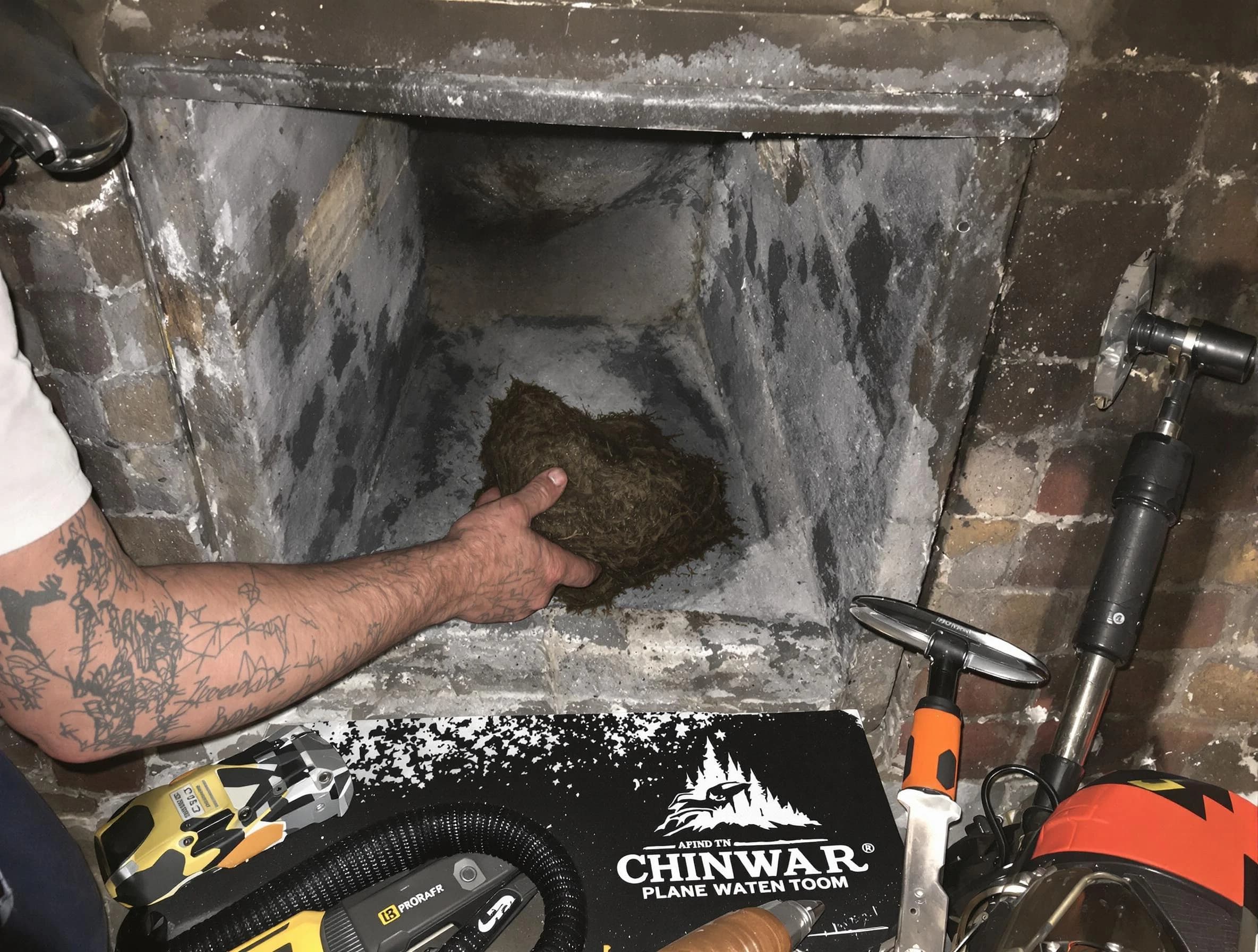 Woodbridge Chimney Sweep safely removing debris and screening chimney in Woodbridge, NJ