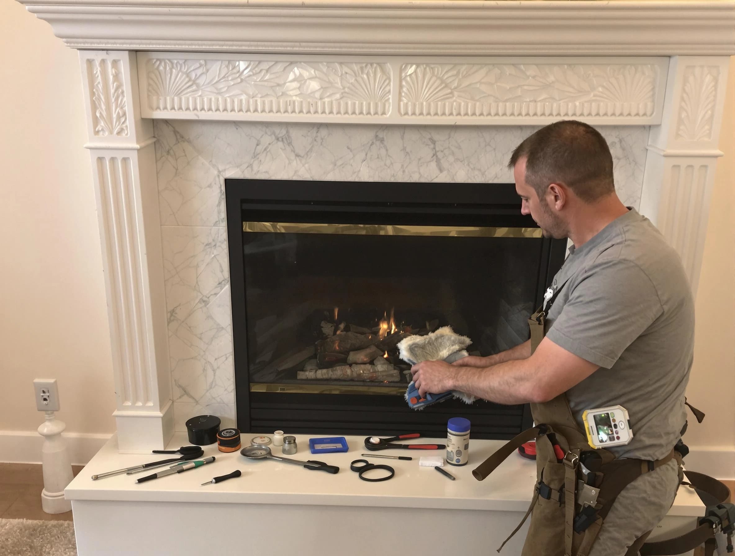 Woodbridge Chimney Sweep performing fireplace maintenance in Woodbridge, NJ